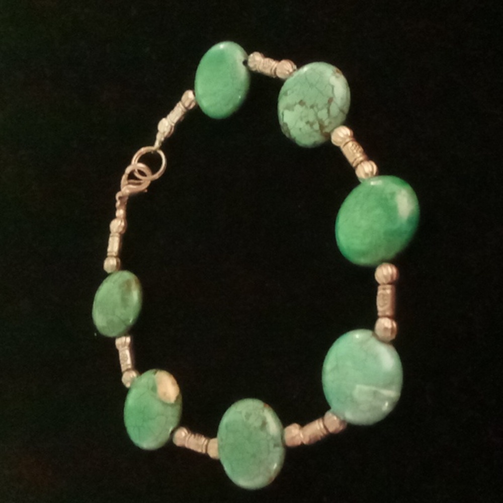 Natural green turquoise bracelet with inclusions size 9